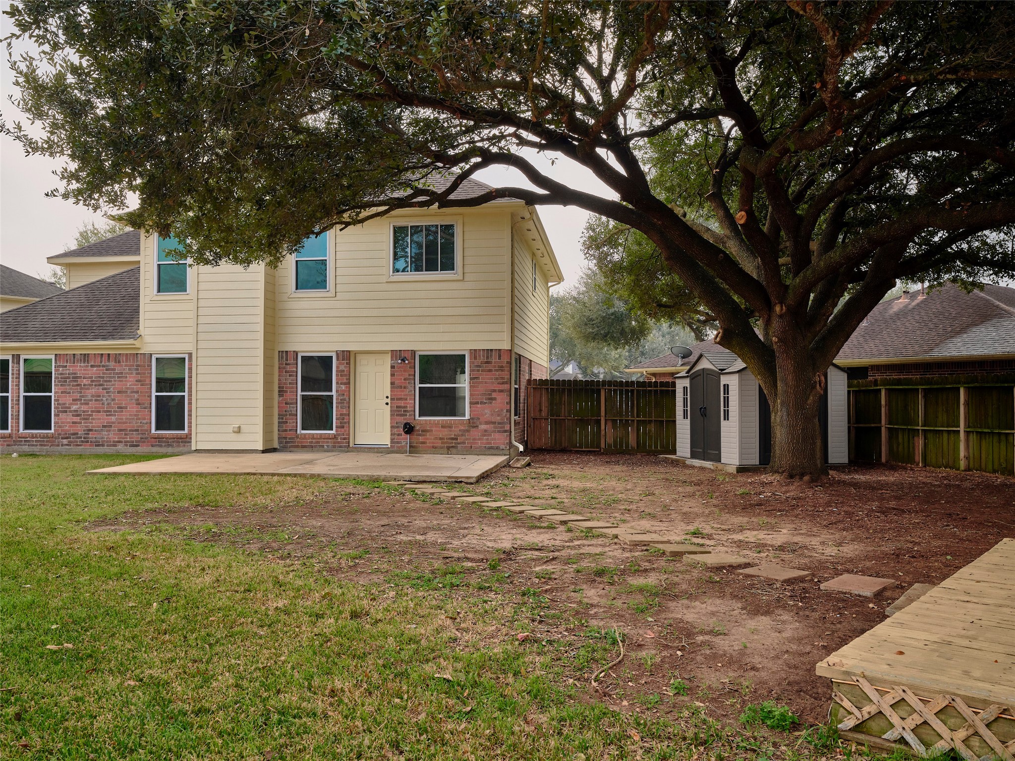 4801 East Columbary Drive Rosenberg, TX 77471 - Photo 48 of 50 a front view of a house with a garden