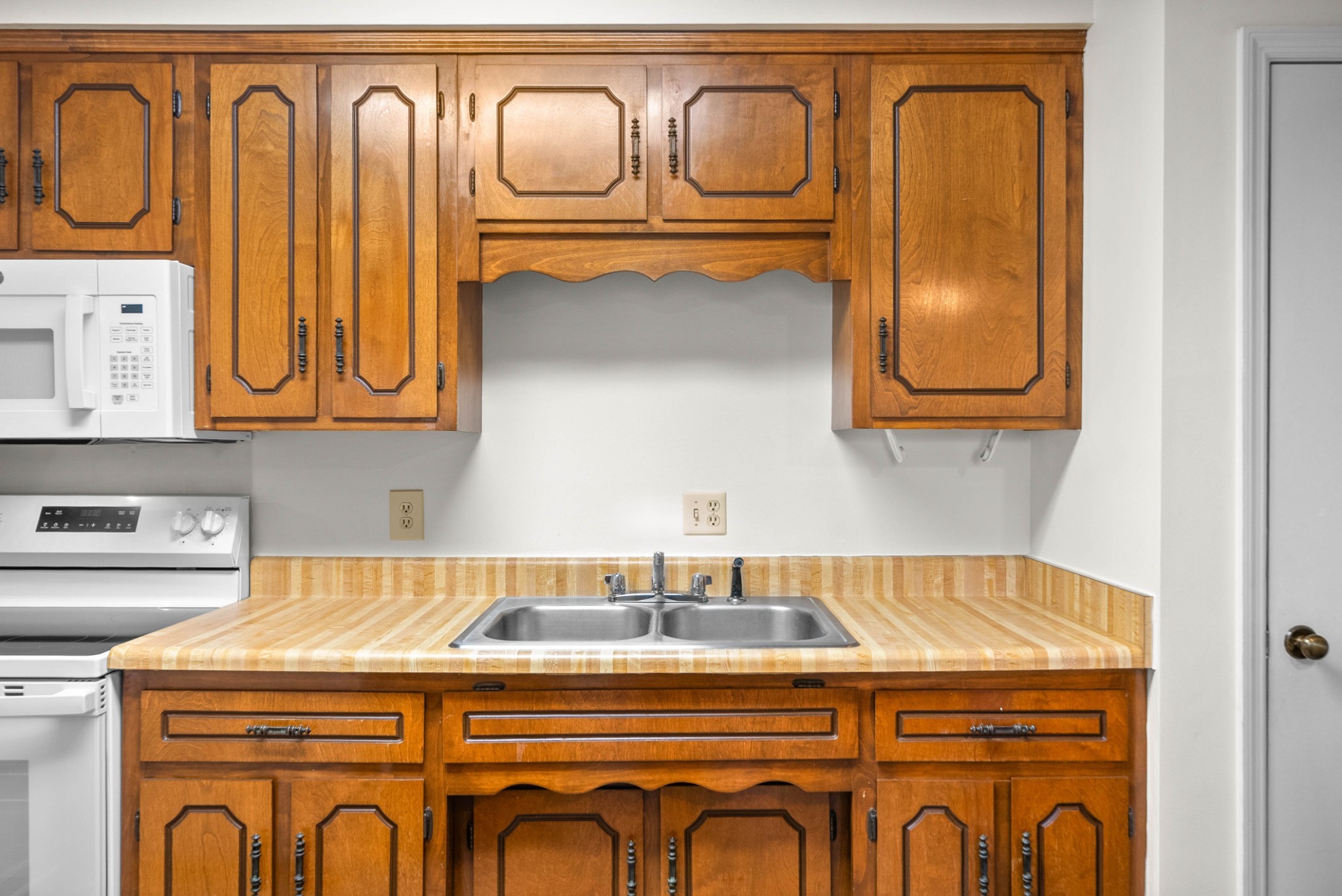 102 Laurel Cove Drive, Unit 30 Hopkinsville, KY 42240 - Photo 6 of 14 a utility room with dryer and cabinets