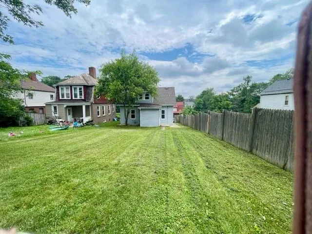 a view of a house with a big yard