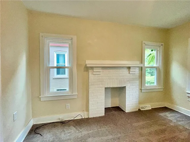 an empty room with windows