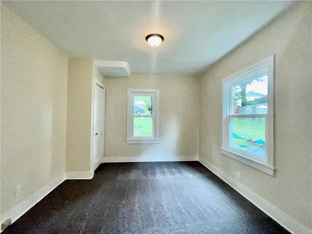 a view of livingroom with hardwood floor and window