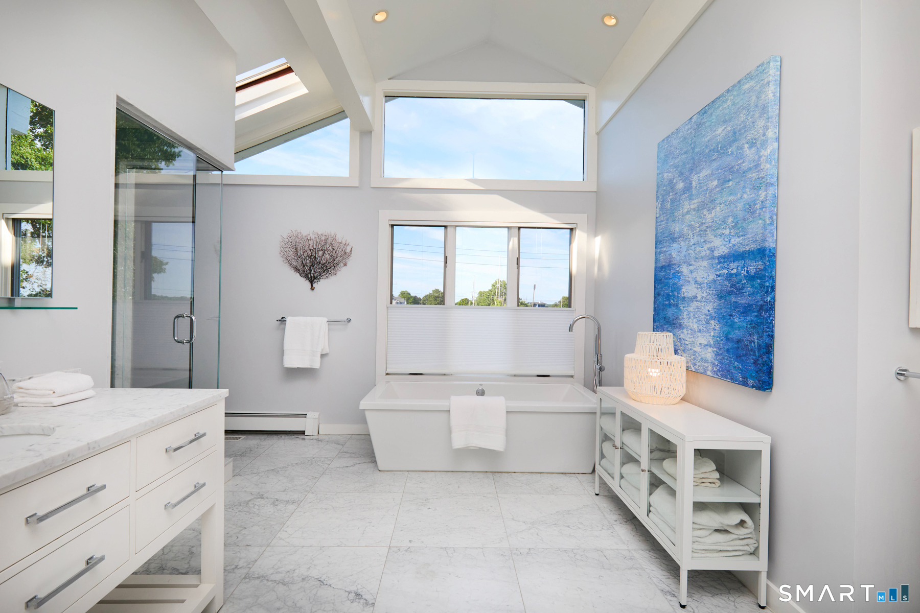 16 Harbor Road Westport, CT 06880 - Photo 26 of 36 a bathroom with a sink a toilet and bathtub