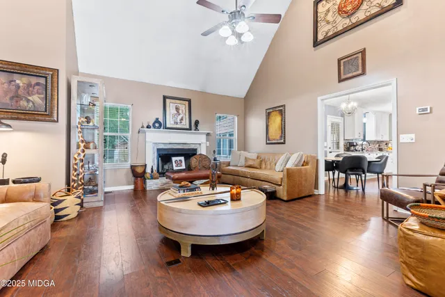 a living room with furniture and a table