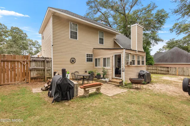 a view of backyard with green space