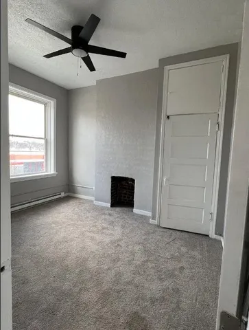 a kitchen with a refrigerator stove and microwave