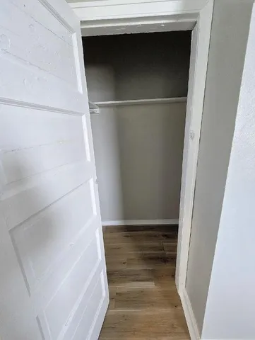 a kitchen with a sink a stove a refrigerator and cabinets