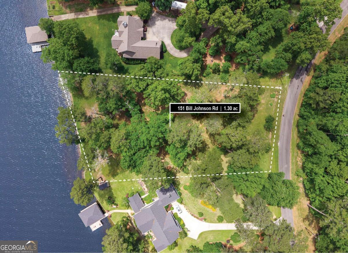 151 Bill Johnson Road Northeast Milledgeville, GA 31061 - Photo 1 of 27 an aerial view of residential house with outdoor space and trees all around