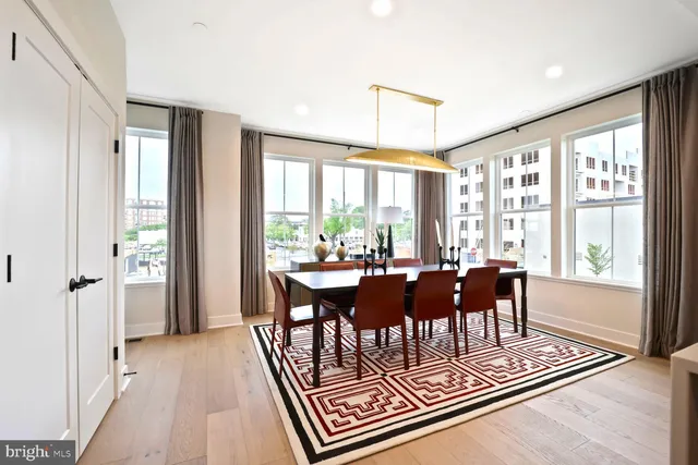a kitchen with lots of counter space and furniture