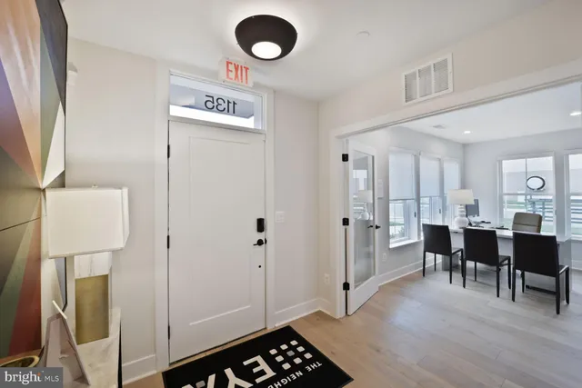 a view of a balcony with chairs