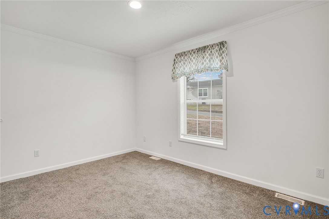 751 South Jones Street Petersburg, VA 23803 - Photo 11 of 13 an empty room with a window