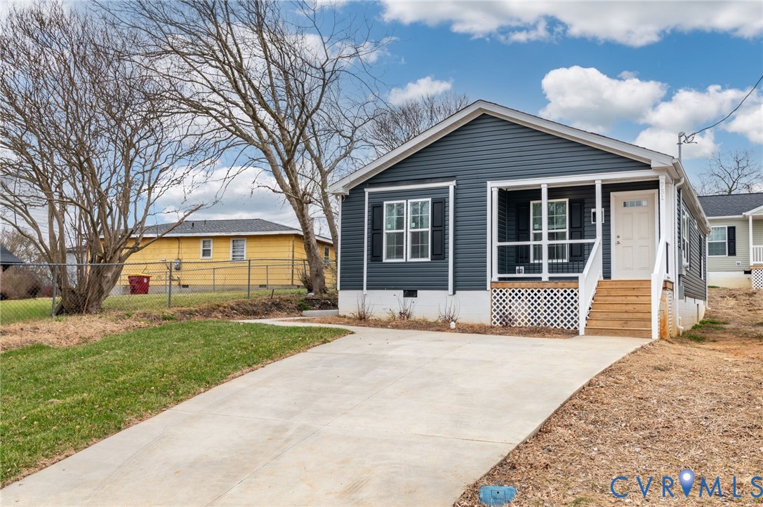 751 South Jones Street Petersburg, VA 23803 - Photo 2 of 13 a view of a house with a yard