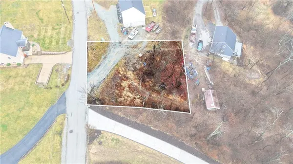 a view of swimming pool from a balcony