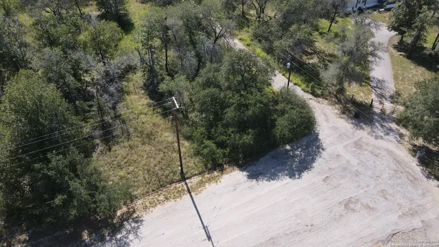 a view of a road with a yard
