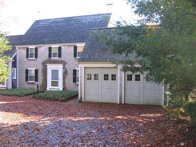 Undisclosed Address Falmouth, MA 02540 - Photo 1 of 14 a view of house with a yard