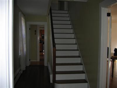 Undisclosed Address Falmouth, MA 02540 - Photo 3 of 14 a view of entryway with wooden floor