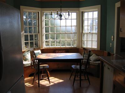 Undisclosed Address Falmouth, MA 02540 - Photo 7 of 14 a view of a dining room with furniture window and outside view
