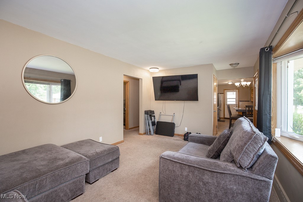 505 Lansing Road Akron, OH 44312 - Photo 2 of 24 Living area featuring light carpet