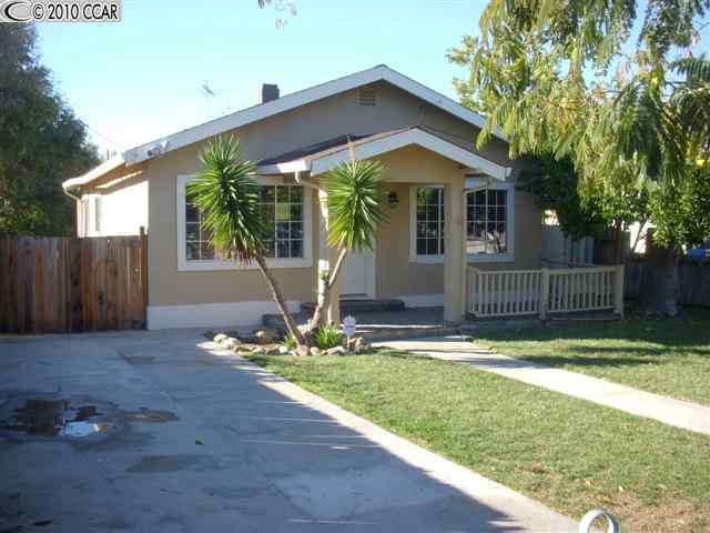 28 Mountain View Avenue Bay Point, CA 94565 - Photo 1 of 1 a front view of house with a yard and potted plants