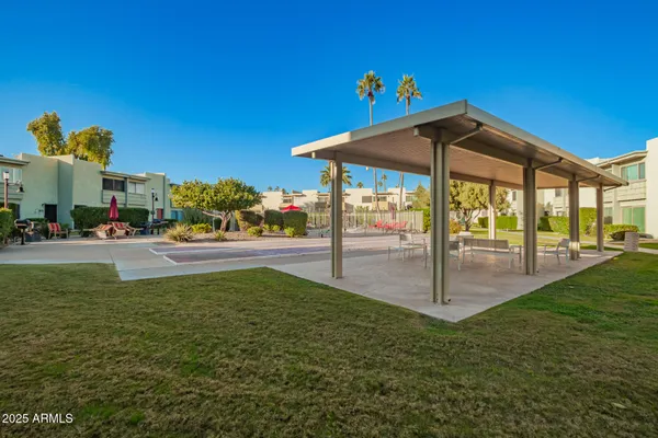 a view of outdoor space yard deck patio and outdoor kitchen