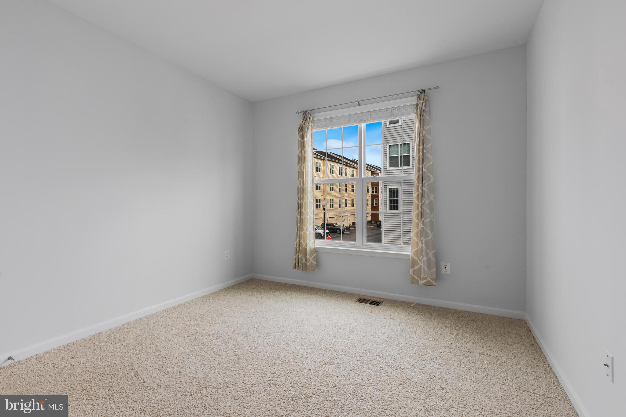 9409 Stonewall Road Manassas, VA 20110 - Photo 14 of 26 a view of empty room with window