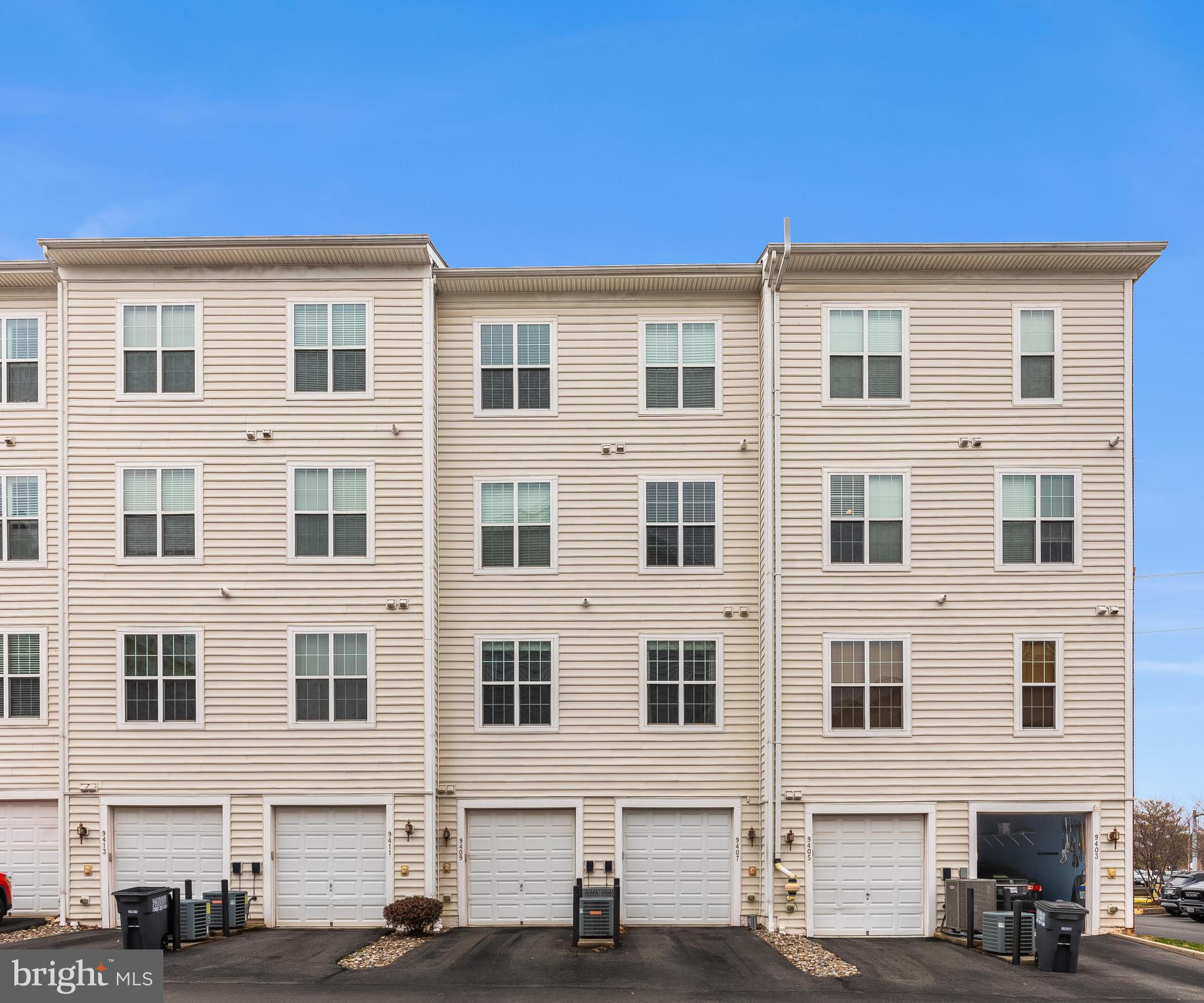 9409 Stonewall Road Manassas, VA 20110 - Photo 21 of 26 a view of a building with a street