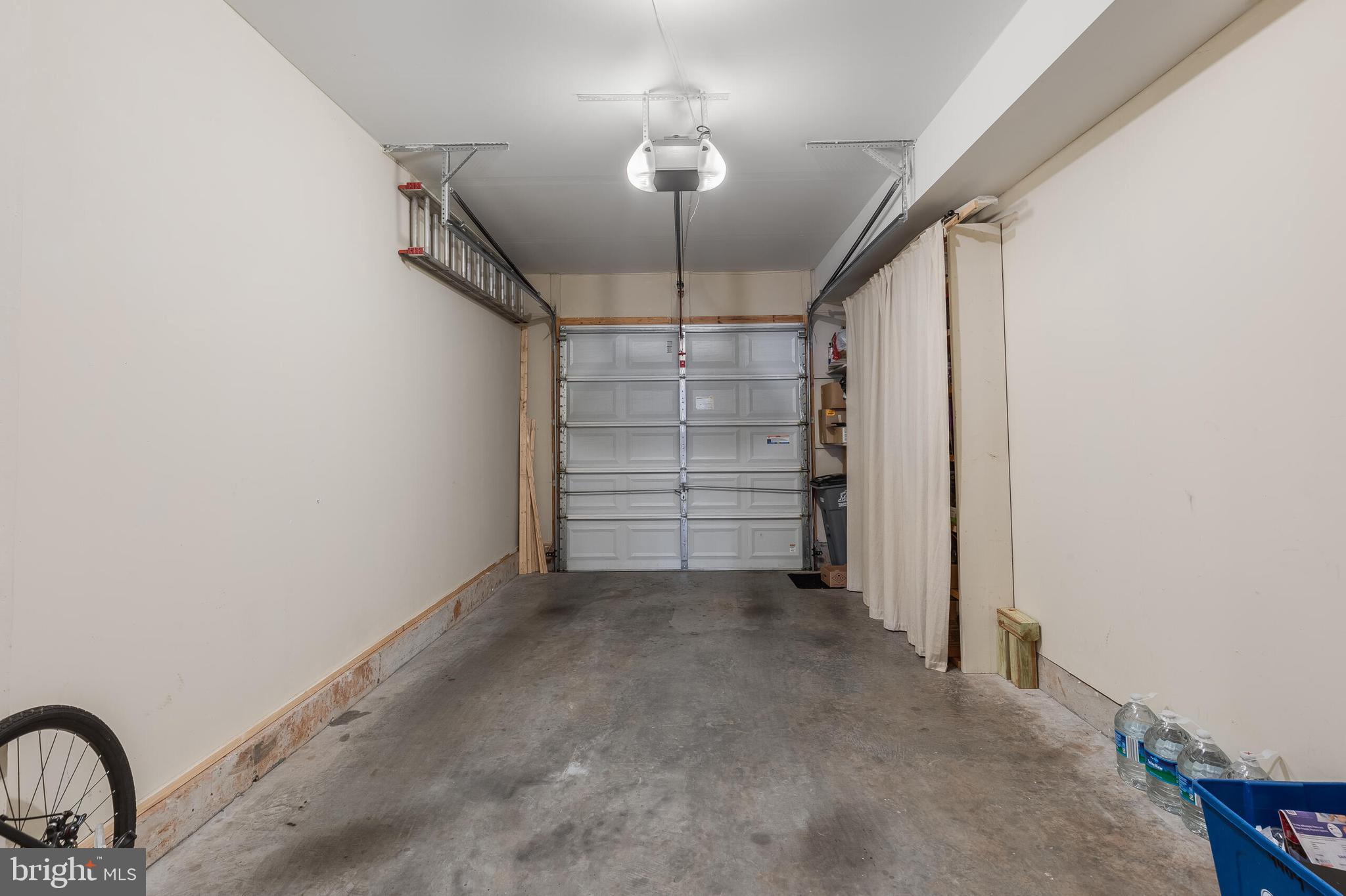 9409 Stonewall Road Manassas, VA 20110 - Photo 23 of 26 a view of a room with a ceiling fan