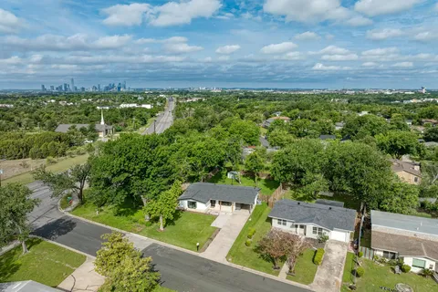 an aerial view of a house with garden