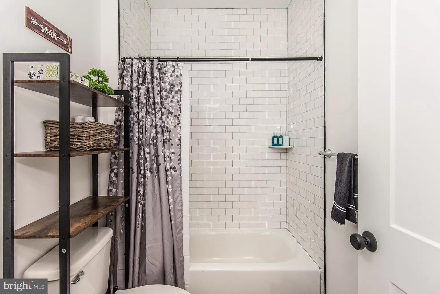 2435 Master Street, Unit 2 Philadelphia, PA 19121 - Photo 8 of 9 a bathroom with a shower