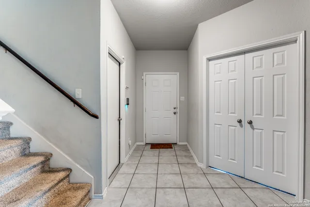a view of an entryway with hallway