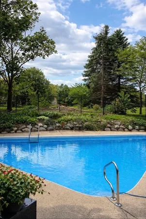 a view of a garden with a fountain