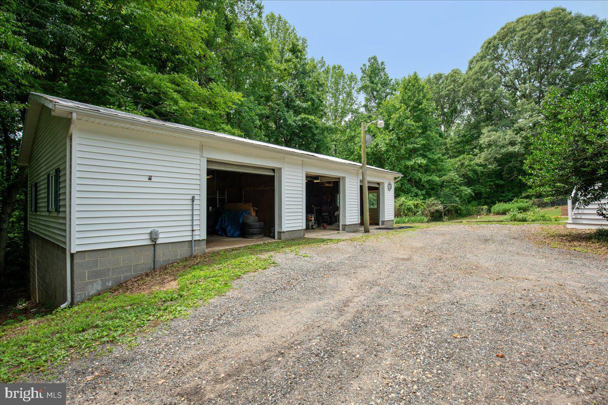 2175 Ponds Wood Road Huntingtown, MD 20639 - Photo 6 of 76 Large garage with workshop, 4th bay below