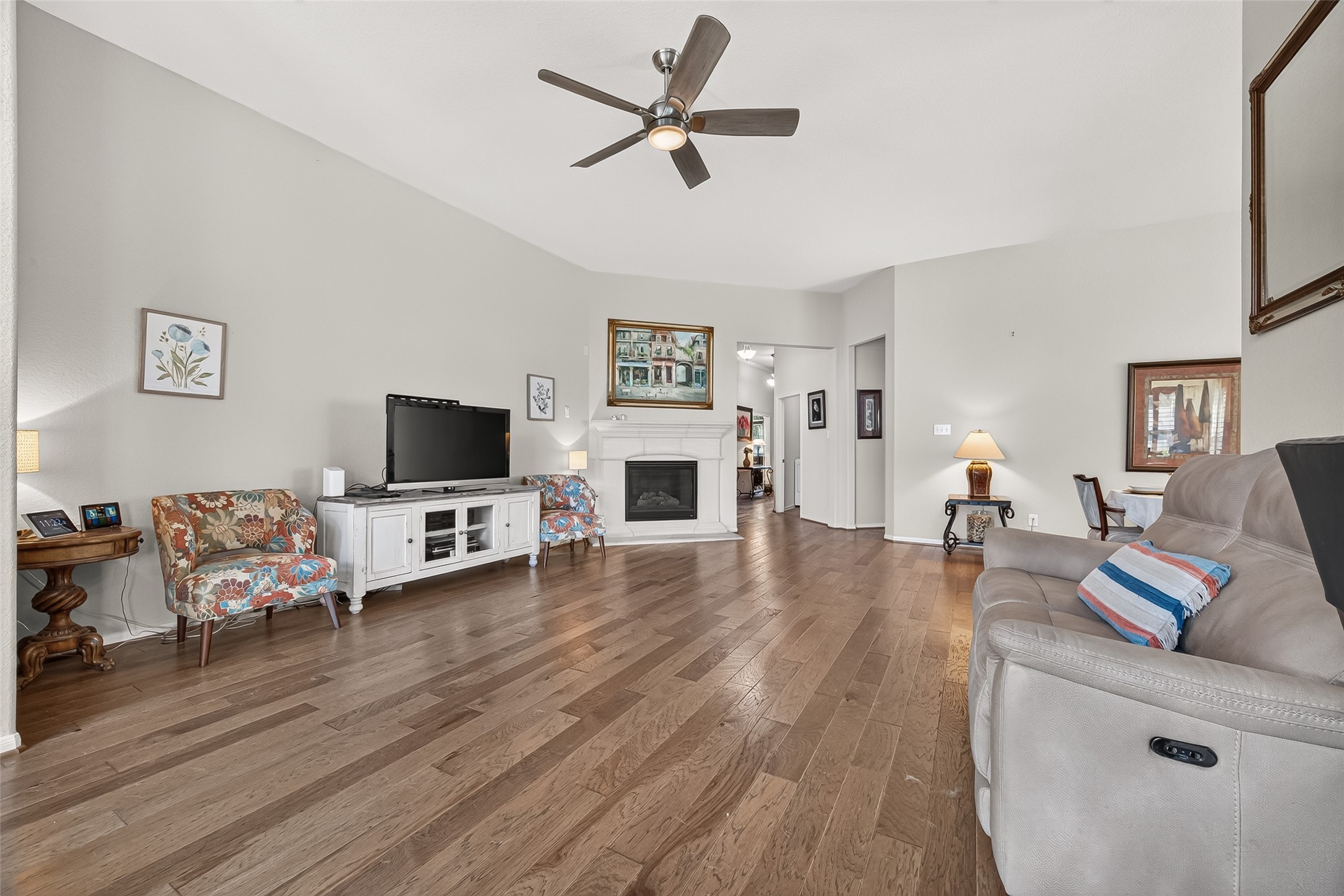 4910 Culver Lane Rosenberg, TX 77471 - Photo 22 of 50 Your spacious living room has an open layout that leads to other areas of the home, creating a welcoming atmosphere.