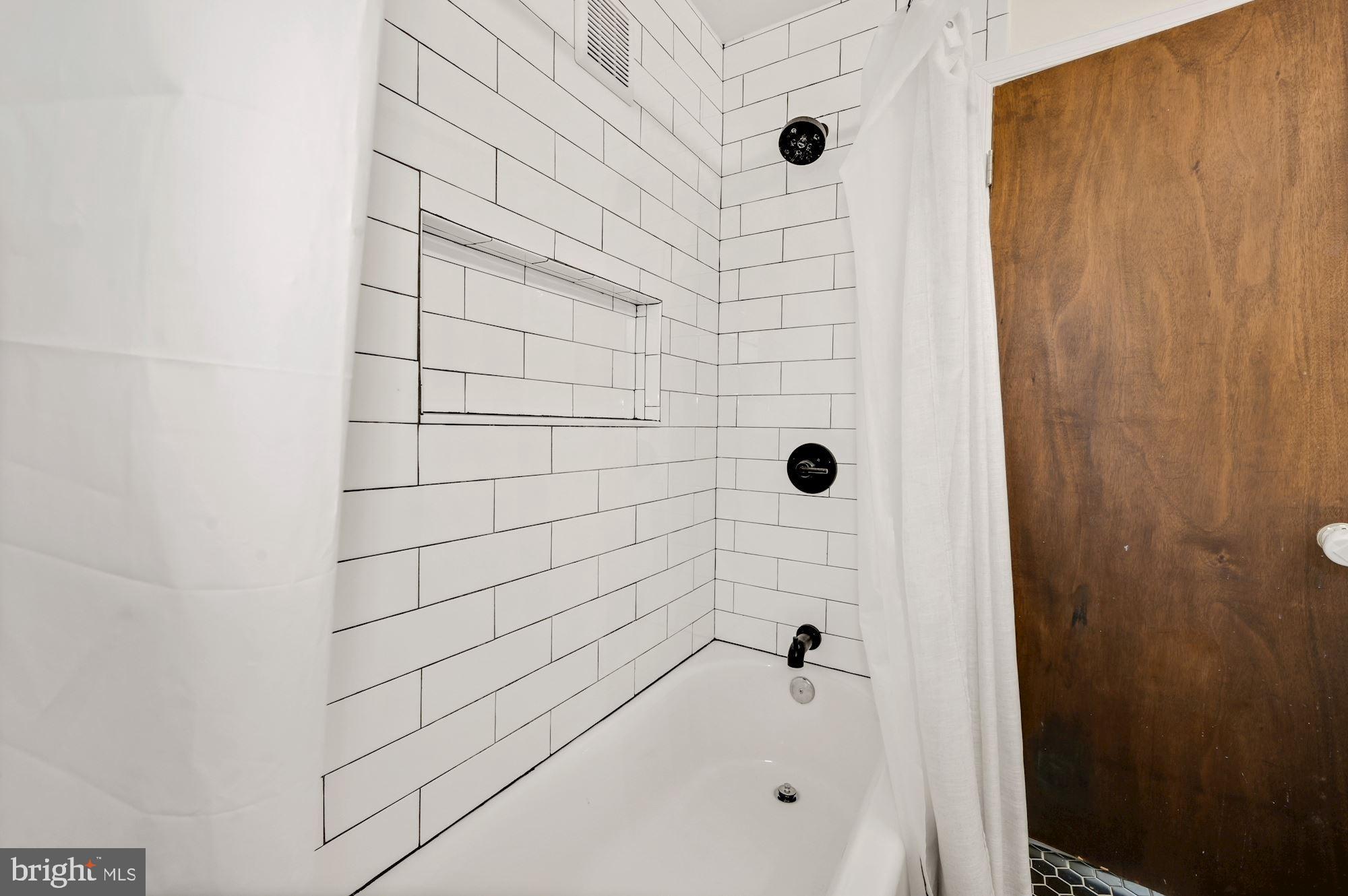 2211 Metzerott Road Adelphi, MD 20783 - Photo 13 of 14 Custom Bath with shower niche