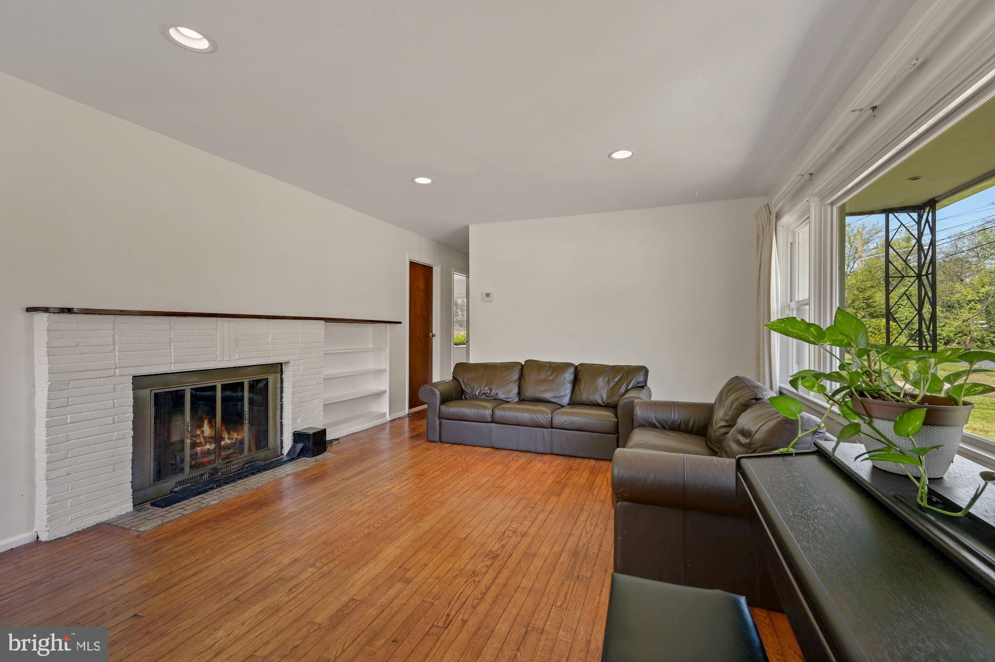 2211 Metzerott Road Adelphi, MD 20783 - Photo 2 of 14 Living Room with Fireplace