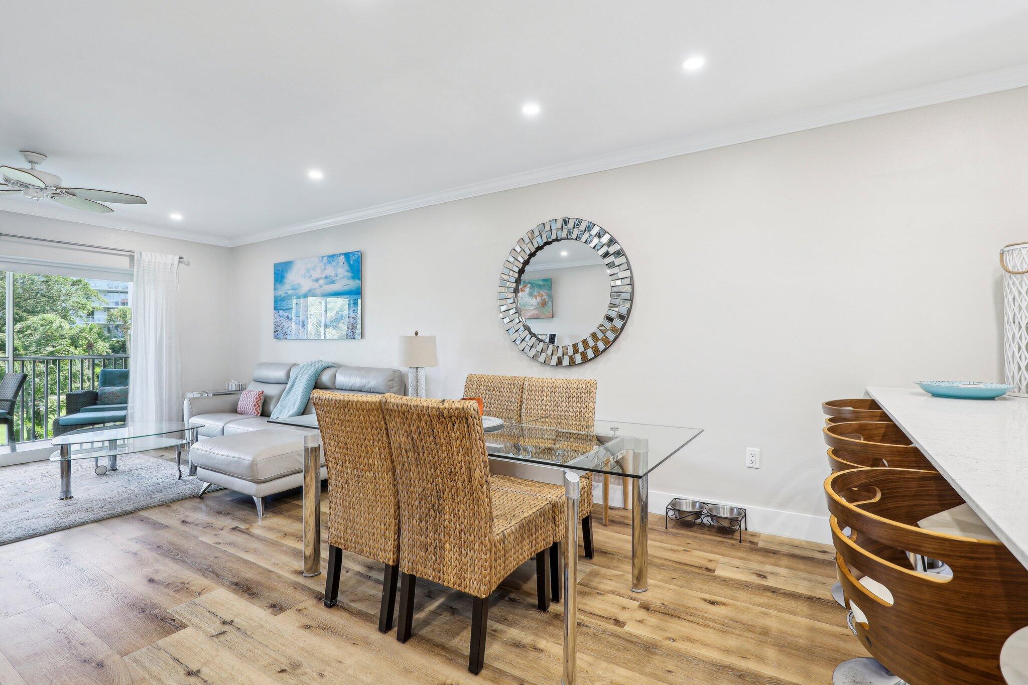 200 East Royal Palm Road, Unit 304 Boca Raton, FL 33432 - Photo 15 of 37 a living room with furniture and a window