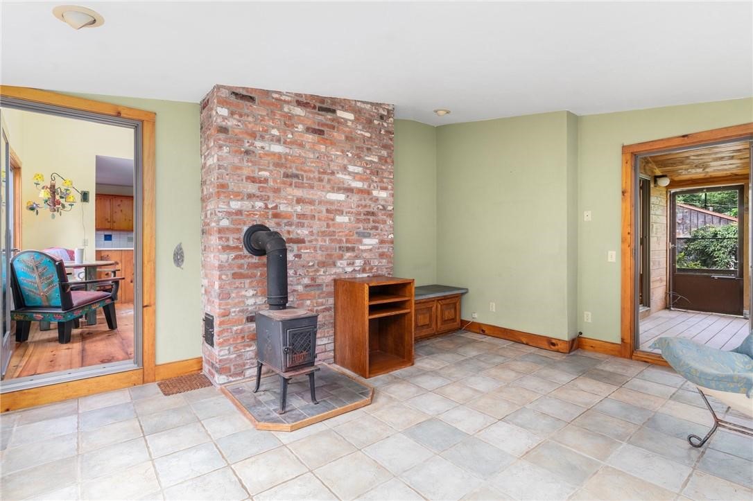 33 Johnson Road Foster, RI 02825 - Photo 29 of 44 Guest house sunroom off living room and bedroom sunroom to the right