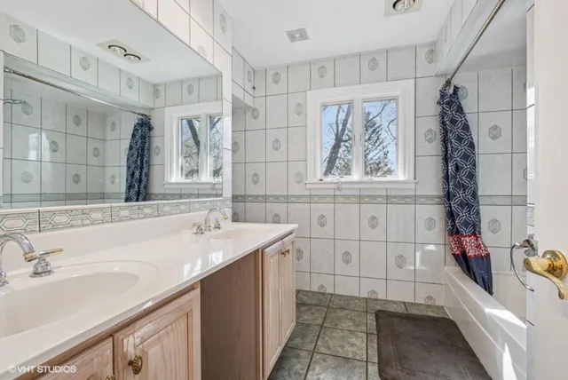 a bathroom with a sink and a tub