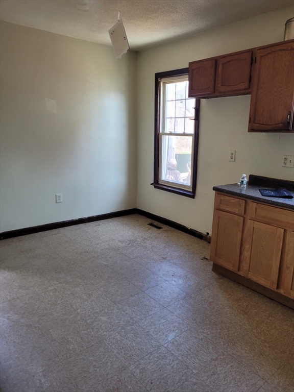 20 Sprague Street West Springfield, MA 01089 - Photo 11 of 12 a view of a kitchen with a sink and a cabinet
