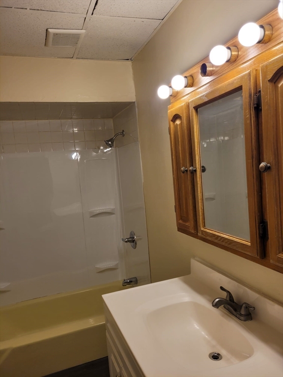 20 Sprague Street West Springfield, MA 01089 - Photo 6 of 12 a bathroom with a sink and a mirror