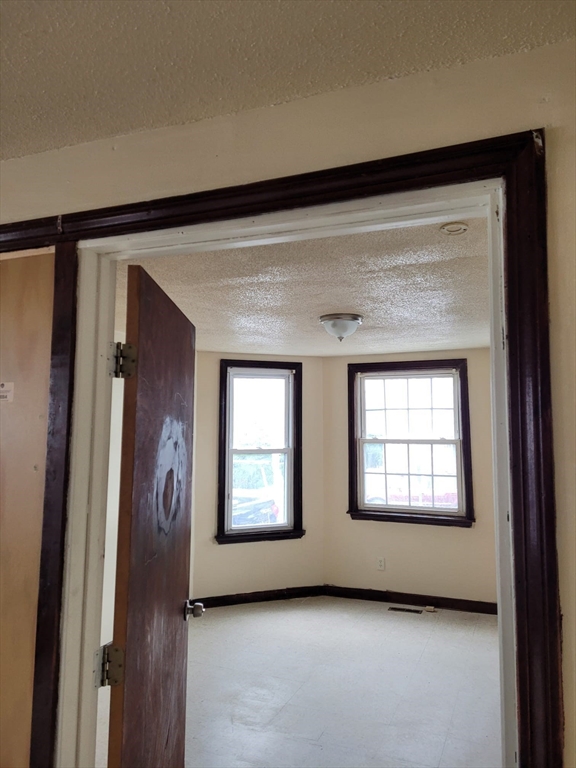 20 Sprague Street West Springfield, MA 01089 - Photo 9 of 12 a view of an empty room and window