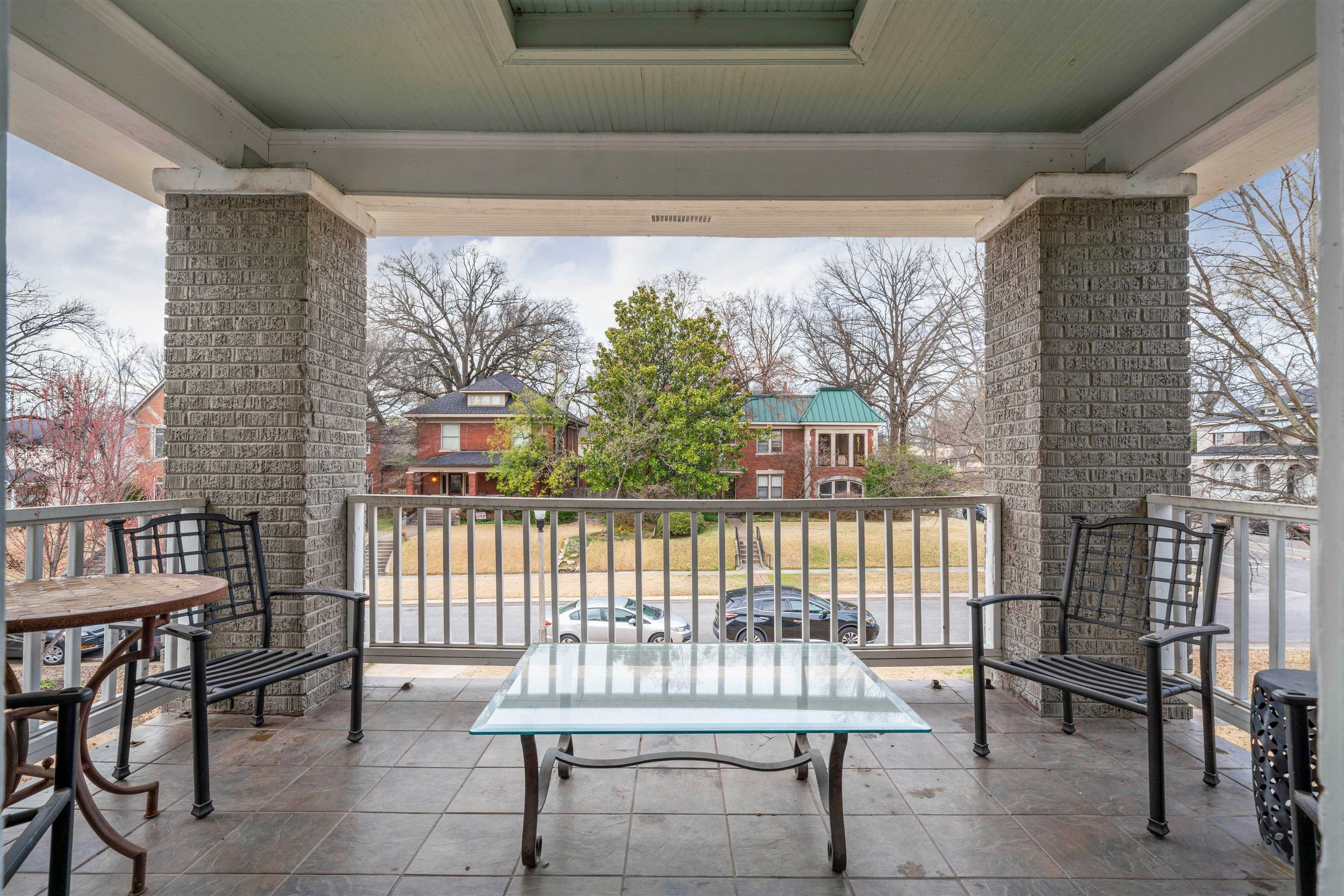 1701 Autumn, Unit 2 Memphis, TN 38112 - Photo 16 of 16 a view of a chairs and table in the balcony