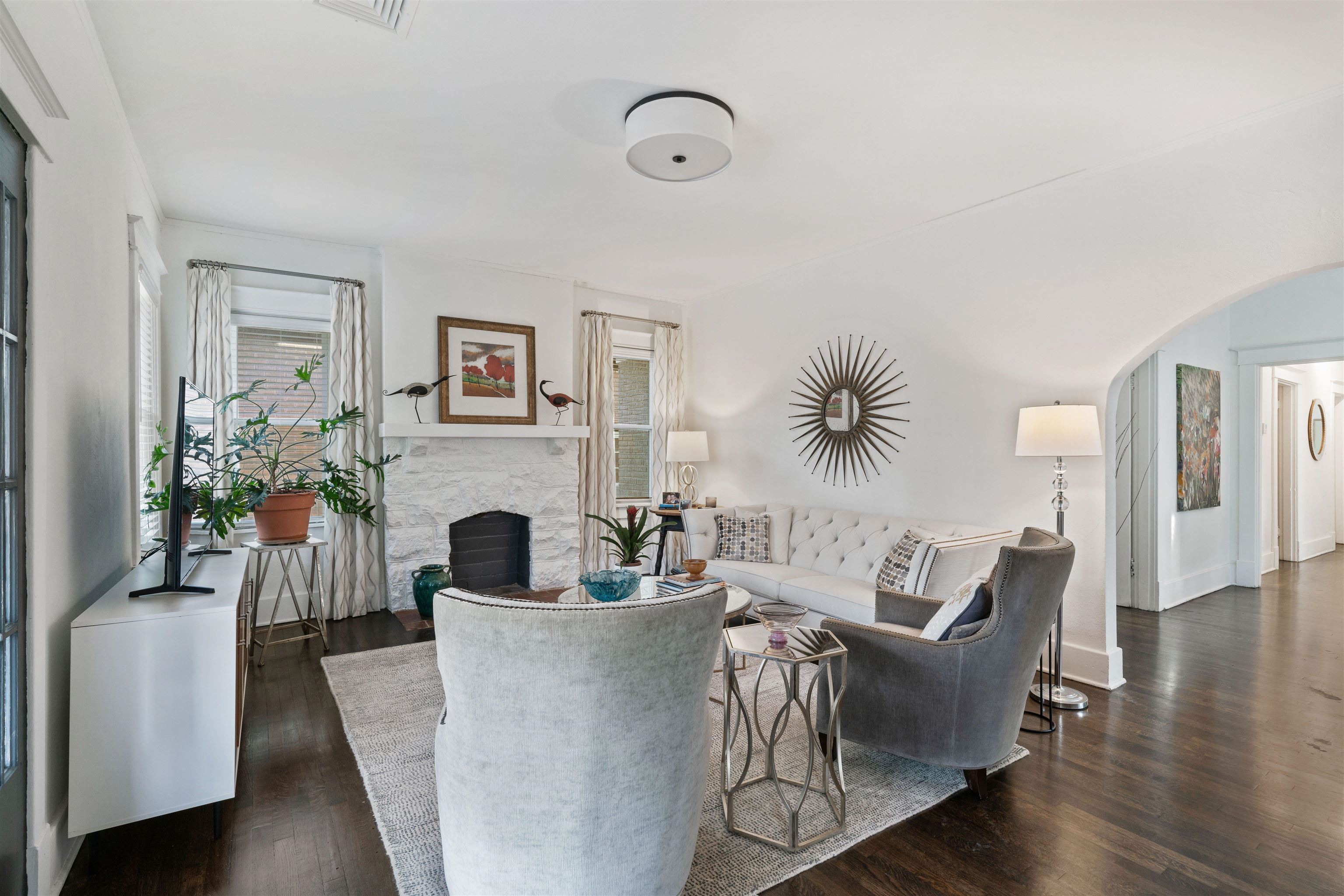 1701 Autumn, Unit 2 Memphis, TN 38112 - Photo 5 of 16 a living room with furniture and a fireplace