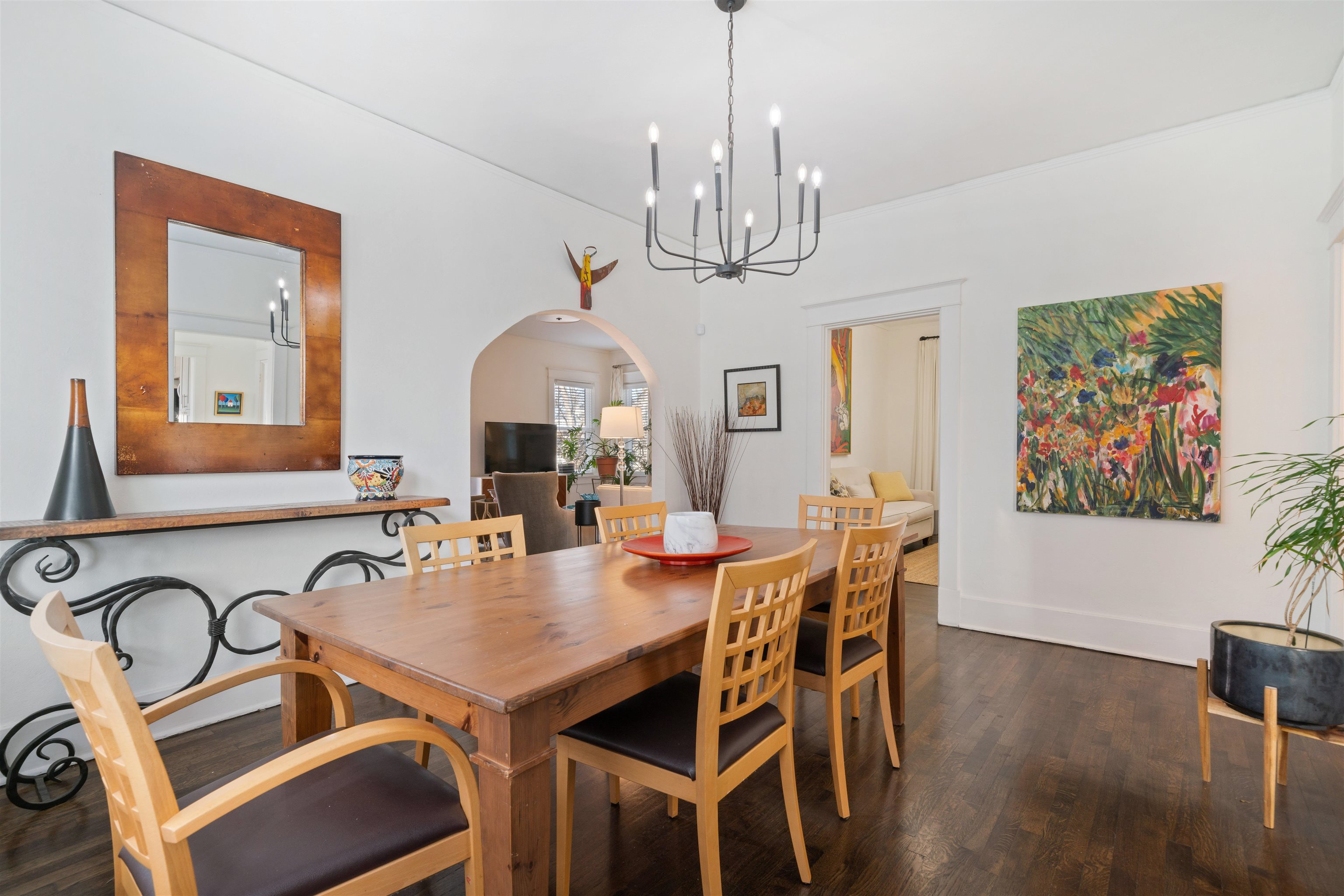 1701 Autumn, Unit 2 Memphis, TN 38112 - Photo 8 of 16 a view of a dining room with furniture wooden floor and chandelier