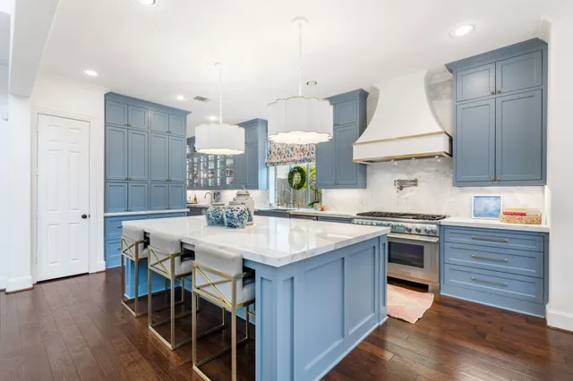 a view of a swimming pool with a lounge chairs