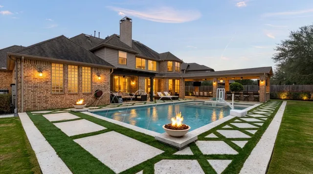 a dining room with furniture a chandelier and wooden floor