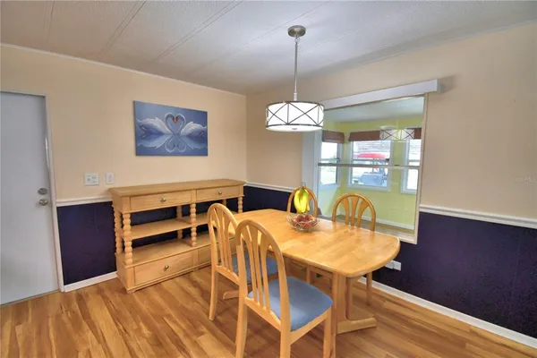 a view of a dining room with furniture