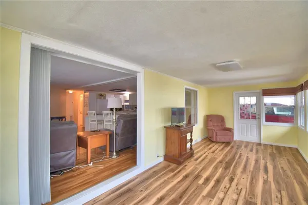 a view of a living room and dining room