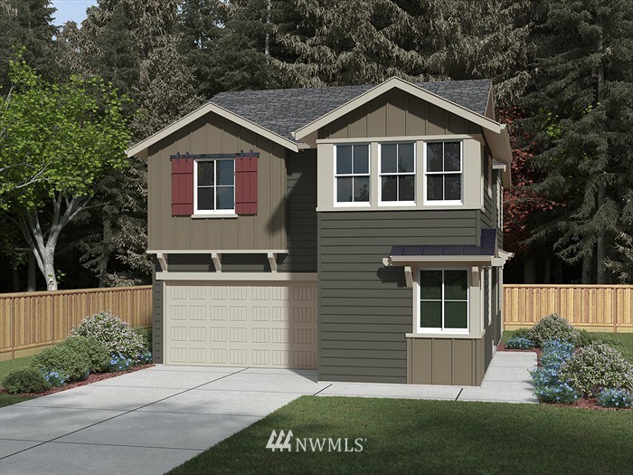 17818 38th Drive Southeast, Unit 9 Bothell, WA 98012 - Photo 1 of 1 a front view of a house with a garden