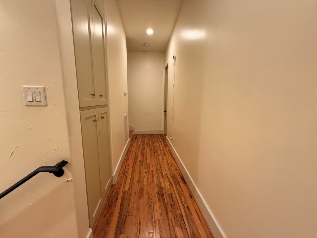 4606 Austin Street, Unit D Houston, TX 77004 - Photo 14 of 25 a view of a hallway with wooden floor