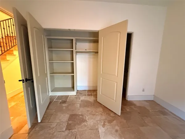 an empty room with a door